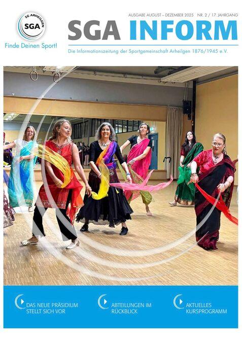 Mehrere Frauen tanzen in bunten Kleidern mit Schleifen in einem hellen, offenem Raum.