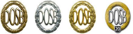 Vier Medaillen des Deutschen Olympischen Sportbundes (DOSB) in Gold, Silber und Bronze sowie eine Jubil&auml;umsmedaille mit &bdquo;20&ldquo;.